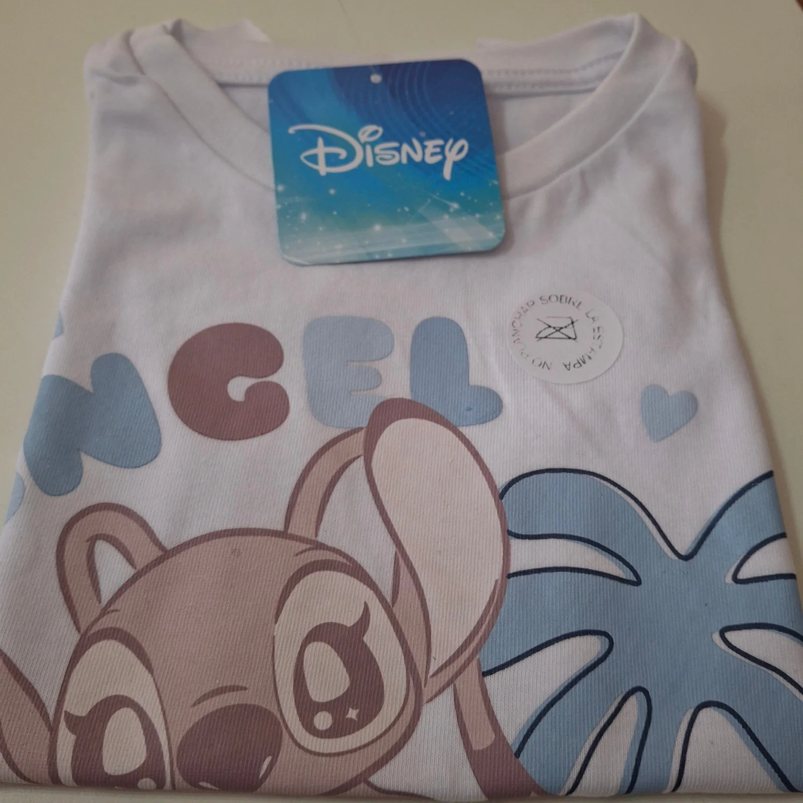 Remera bebé Disney Stitch y Angel blanca volados - Imagen 3