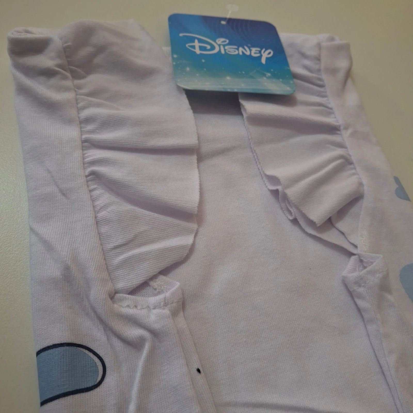 Remera bebé Disney Stitch y Angel blanca volados - Imagen 4