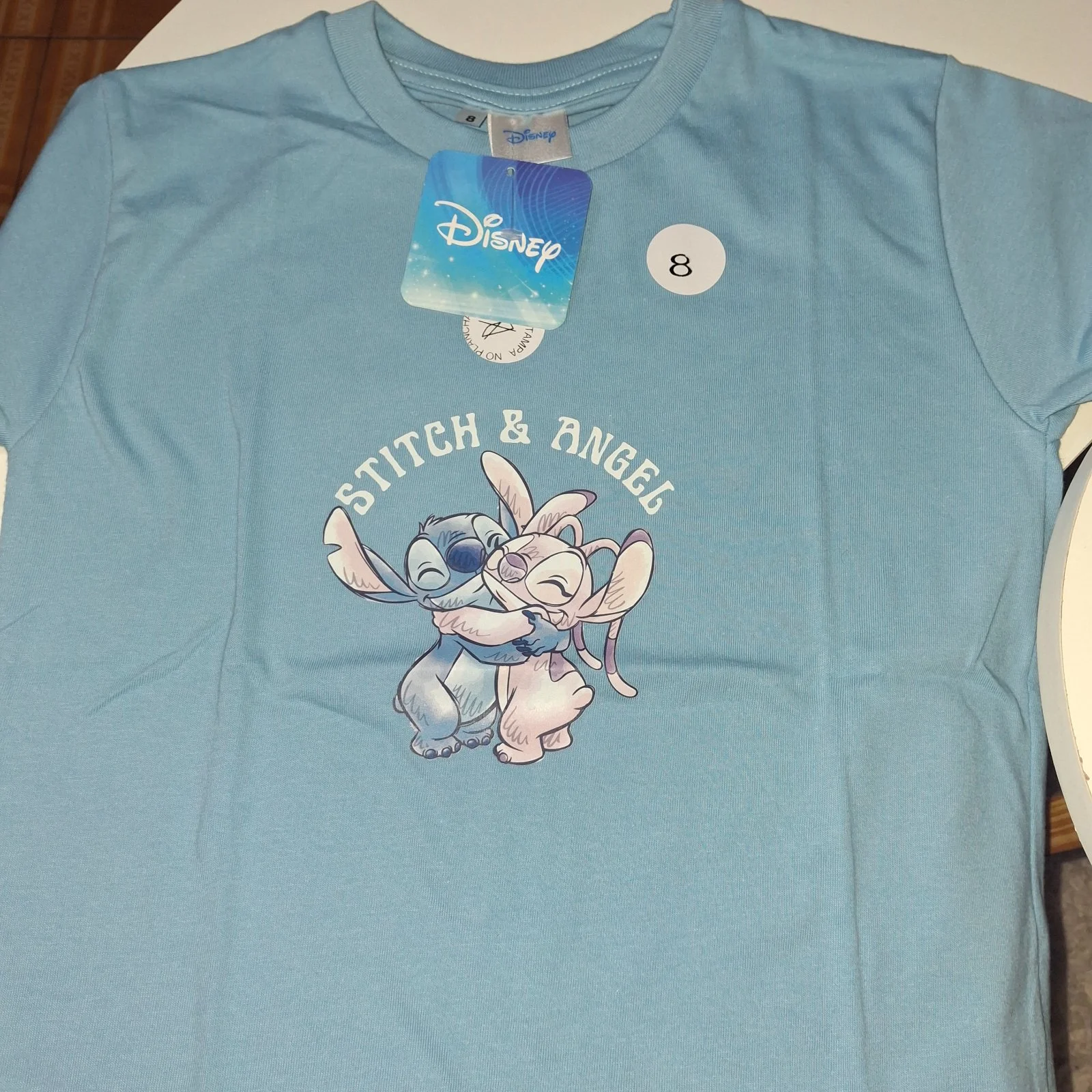Remera Disney Stitch y Angel